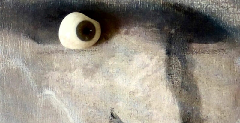 Kunstwerk mit einem Gesicht und einem markanten Auge